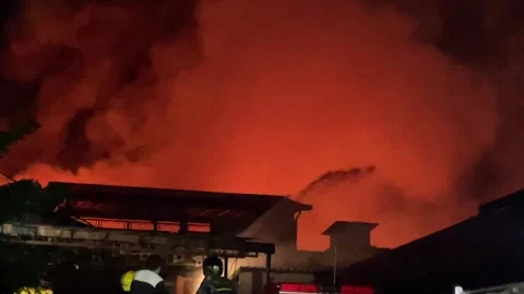 Heavy fire in plastic storage warehouse Stock Footage 290945044