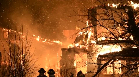 Heavy Flames With Two Firefighters in Middle Stock Footage 59868094