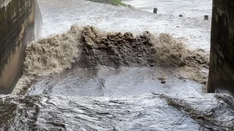 Heavy flow of rainwater in the river 스톡 동영상 307853652