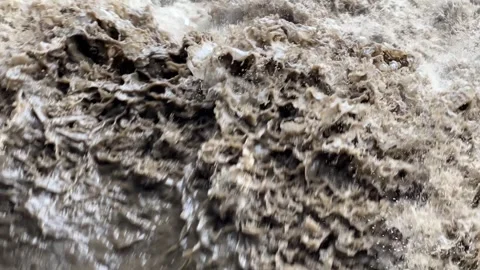 Heavy flow of rainwater in the river 스톡 동영상 308213293