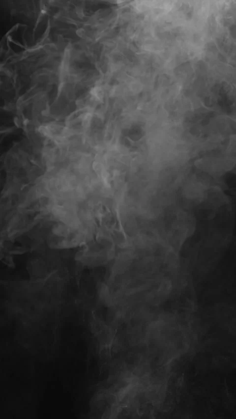 Heavy fog churns on left side of black screen, vertical format Stock Footage 340130880