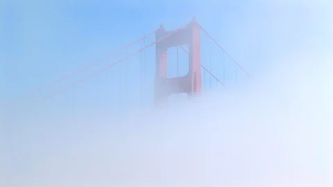 Heavy fog of San Francisco’s ionic Golden Gate Bridge. California USA Stock Footage 101855570