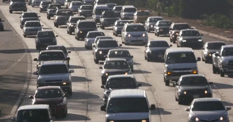 Heavy freeway traffic in Los Angeles California with Bus. Highway 101 Stock Footage 72330810