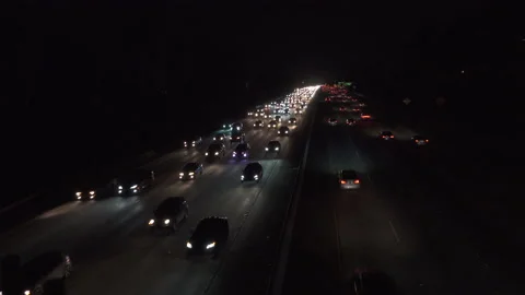 Heavy freeway traffic at nigh Stock Footage 137481876