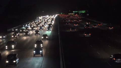 Heavy freeway traffic at nigh Stock Footage 137481900