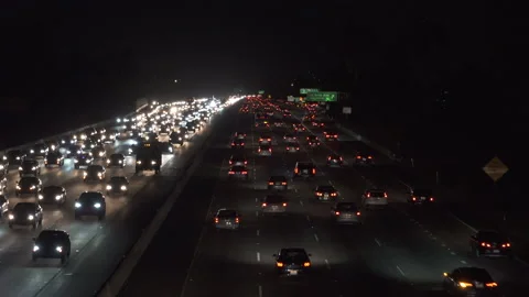 Heavy freeway traffic at nigh Stock Footage 137482234