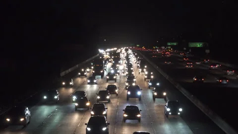 Heavy freeway traffic at nigh Stock Footage 137482241