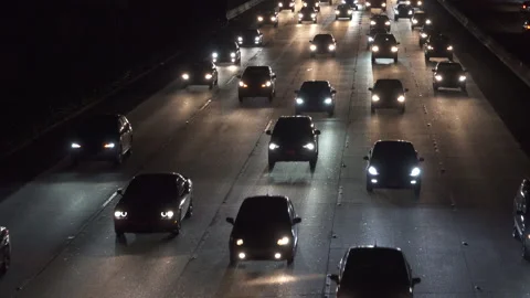 Heavy freeway traffic at nigh Stock Footage 137484155