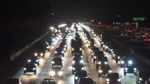 Heavy freeway traffic at nigh Stock Footage 137484210