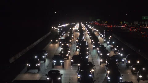 Heavy freeway traffic at nigh Stock Footage 137484252