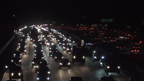 Heavy freeway traffic at nigh Stock Footage 137484716