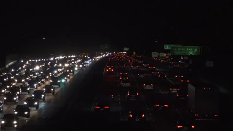 Heavy freeway traffic at nigh Stock Footage 137485249