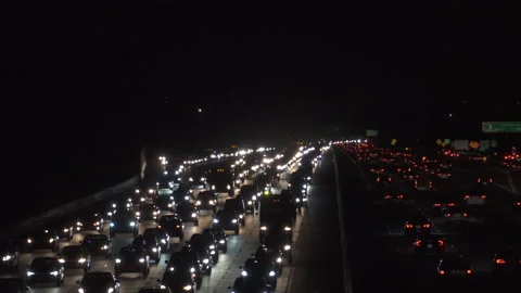 Heavy freeway traffic at nigh Stock Footage 137485302