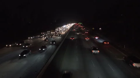 Heavy freeway traffic at nigh Stock Footage 137485841