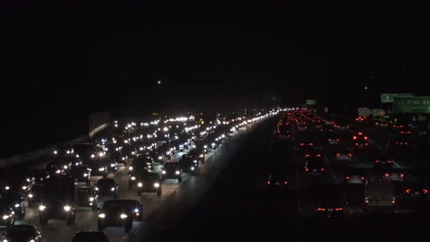 Heavy freeway traffic at nigh Stock Footage 137485961