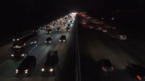 Heavy freeway traffic at nigh Stock Footage 137485979