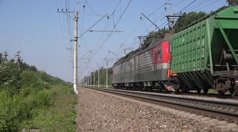 Heavy freight train of mixed type hopper wagons Stock Footage 65002111