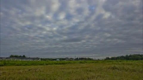 Heavy gray clouds over lake, timelapse Video stock 12060464