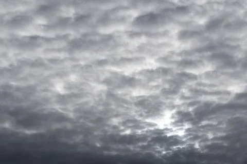 Heavy gray stratocumulus clouds fill the sky 스톡 사진