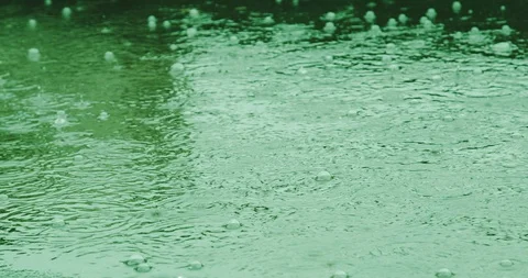 Heavy Green Acid Rain Falling with Bubbles Stock Footage