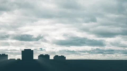 Heavy grey clouds fly over the city with light streaks push through buildings. Stock Footage 153908381