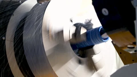 Heavy industrial worker performs a mechanical operation on a machine for th.. Stock Footage 310052764
