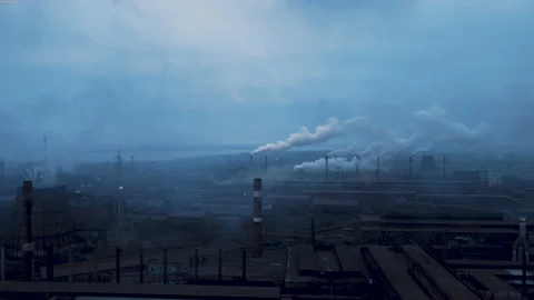 Heavy industry. billowing pollution into a blue sky. Poor environment city Stock Footage 150700934