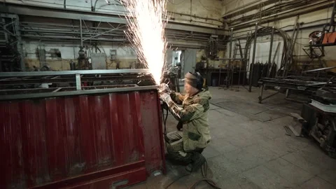 Heavy Industry Engineering Factory Interior with Industrial Worker Using Angle Video stock 178851796