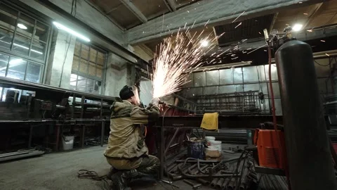 Heavy Industry Engineering Factory Interior with Industrial Worker Using Angle Stock Footage 178851855