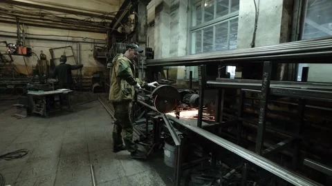 Heavy Industry Engineering Factory Interior with Industrial Worker Using Angle Stock Footage 178852036