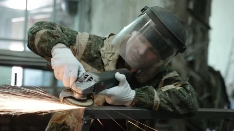 Heavy Industry Engineering Factory Interior with Industrial Worker Using Angle Stock Footage 178853520