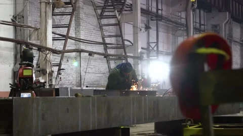 Heavy Industry Engineering Factory Interior with Industrial Worker Using Angle Stock Footage 203881644