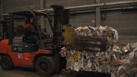 Heavy lifter dropping paper garbage to the ground 4K 動画素材 171943283