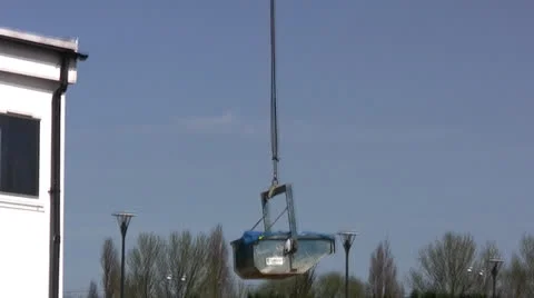 Heavy load attached to crane hook Stock Footage 22799242