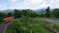 Heavy loaded truck driving slowly uphill mountain serpentines Flores Indonesia 4k or 4k+ Resolution