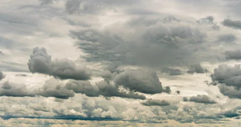 Heavy low overcast sky, puffy clouds time lapse, video loop Stock Footage 116199981