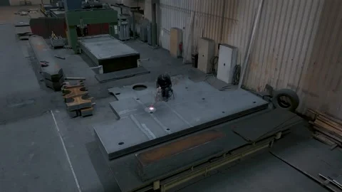 Heavy Machine Tool Cutting Large Steel Plate, Metal Workshop, Wide Shot Stock Footage 341529956