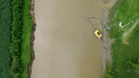 Heavy Machinery Dredging the Cauca River Stock Footage 310701600