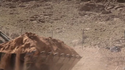 Heavy machinery in excavation at Forward Operating Base Whitehouse - 2012 Stock Footage 104298859