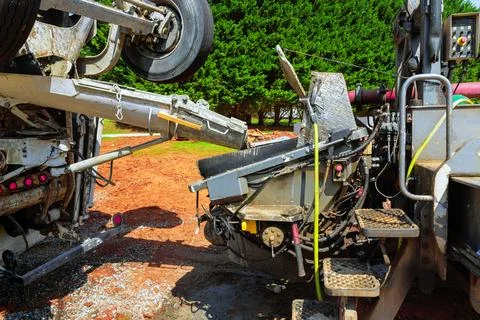 Heavy machinery in operation during construction work at rural site with green Stock Photos