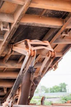 Heavy machinery operation under bridge industrial site close-up view engine.. Foto stock