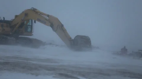 Heavy Machinery in Winter Storm Video stock 33723192