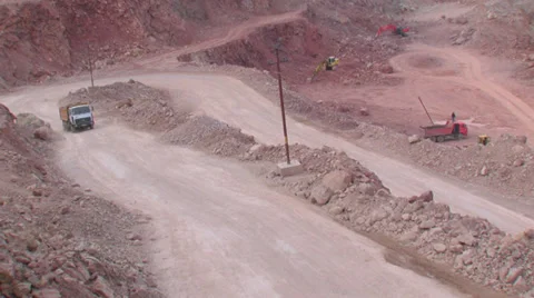 Heavy machinery working on open-pit mining operations Stock Footage 29660332
