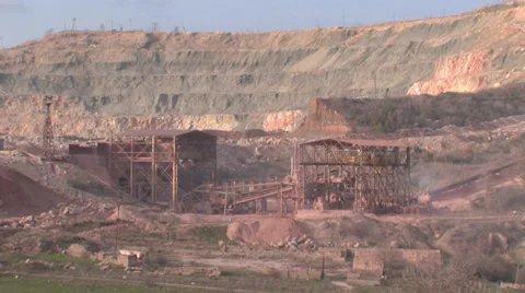 Heavy machinery working on open-pit mining operations Stock Footage 29660963