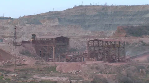 Heavy machinery working on open-pit mining operations Stock Footage 29661643