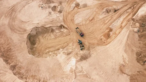Heavy machinery working in sand quarry, aerial view 動画素材 104953885