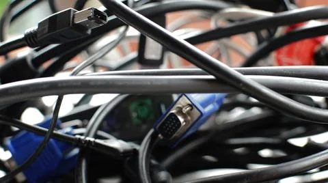 Heavy Mess Of Computer Cables And Other Computer Equipment Stock Photos