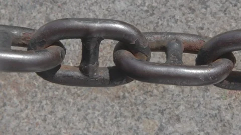 Heavy Metal Chain Swaying Gently in the Wind Close-Up Stock Footage 101606134