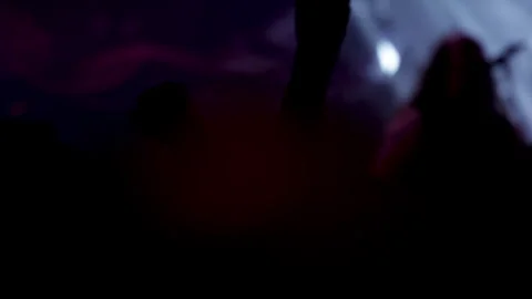 Heavy metal concert theme devil horns salute crowd silhouette. Stock Footage 331836922