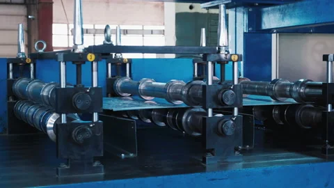 Heavy Metal Press. Roller on Machine. Production of Steel Wall Panels. Metal Stock Footage 211609759